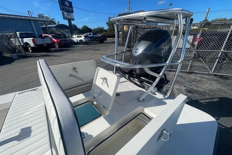 Slide: The Image of 2026 Maverick HPX-17 V boat with Yamaha engine, parked outdoors near dealership. - 9