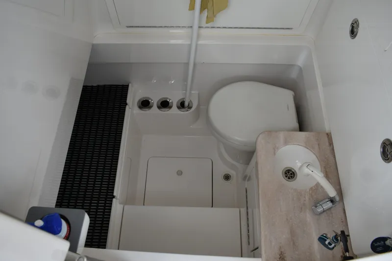 Slide: The Image of Compact bathroom in 2021 Valhalla V-33 boat with toilet and sink. - 8