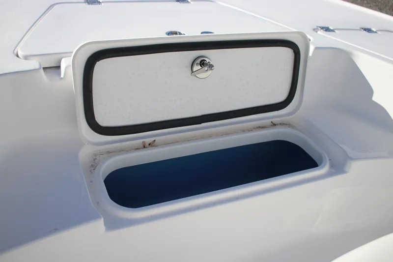 Slide: The Image of Open storage compartment on 2026 Tidewater 2210 Carolina Bay boat. - 11