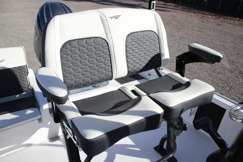 Slide: The Image of 2026 Tidewater 2210 Carolina Bay boat seats with black and white upholstery. - 19