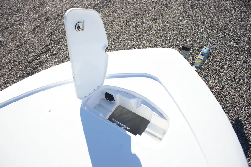 Slide: The Image of Open hatch on 2026 Tidewater 2210 Carolina Bay boat, showing storage compartment. - 8