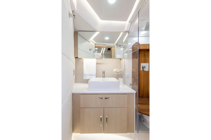 Slide: The Image of Manufacturer Provided Image: Luxurious bathroom in 2026 Regal 36 Grande Coupe yacht, featuring modern fixtures and elegant design. - 17