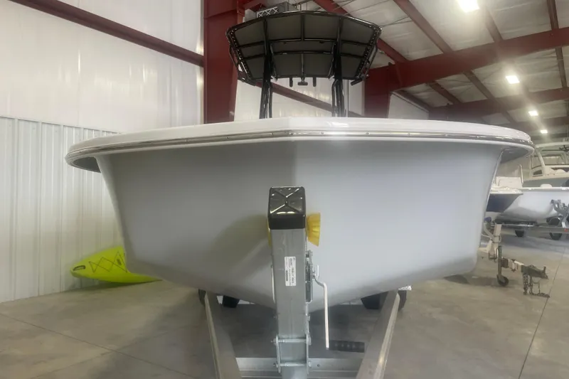 Slide: The Image of 2023 Savannah SS21 boat in indoor storage, front view. - 2
