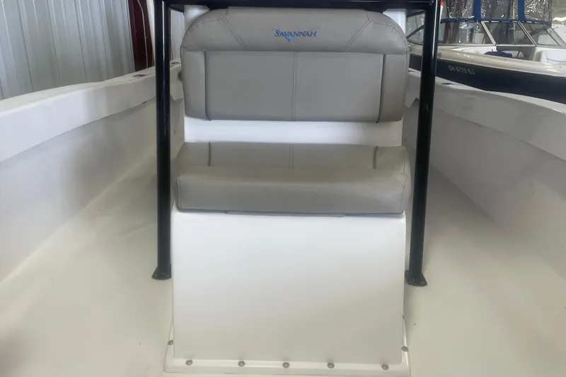 Slide: The Image of 2023 Savannah SS21 boat interior with gray seating and sleek design. - 8