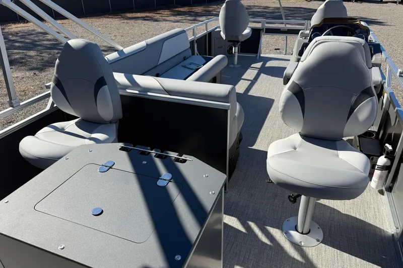 Slide: The Image of 2026 Avalon VENTURE 85 QUAD pontoon boat interior with modern seating and spacious layout. - 11