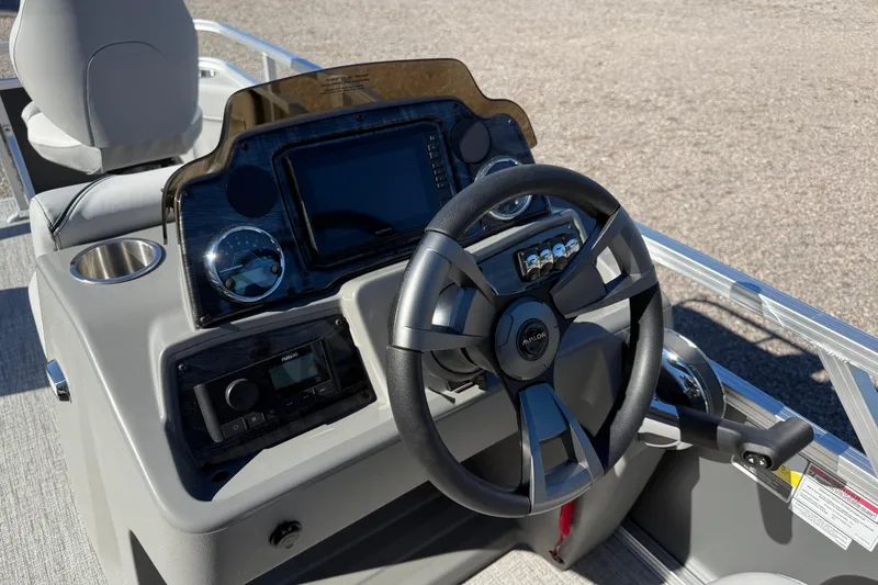 Slide: The Image of Steering console of 2026 Avalon VENTURE 85 QUAD boat with modern controls. - 9
