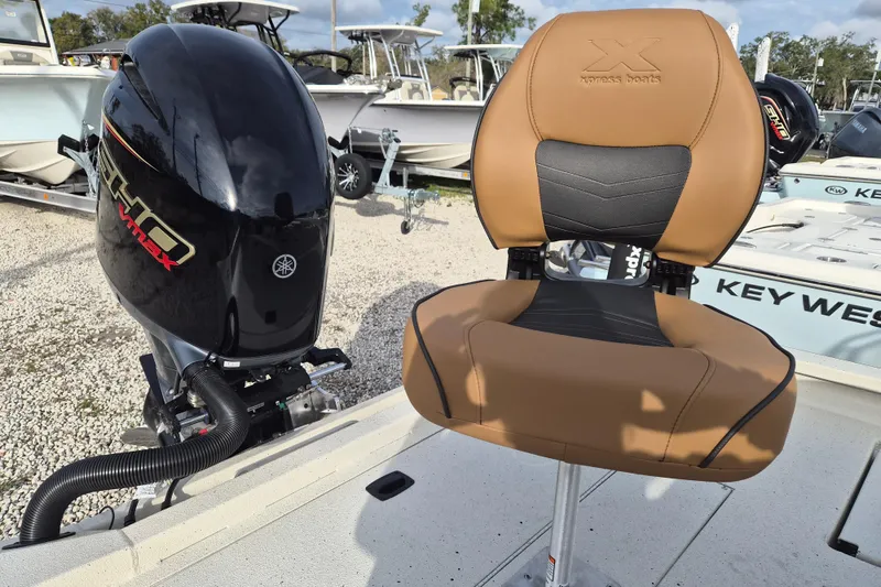 Slide: The Image of 2026 Xpress H22B Bay boat with Yamaha VMAX engine and tan seating. - 12