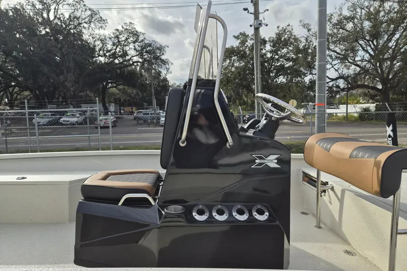 Slide: The Image of 2026 Xpress H22B Bay boat interior with sleek console and seating. - 5