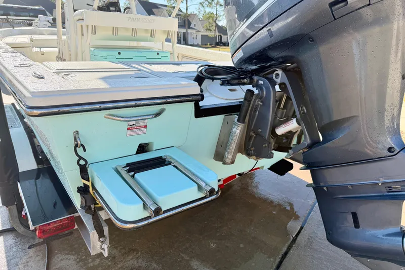 Slide: The Image of 2015 Pathfinder 2400 TRS boat with outboard motor and swim platform. - 4