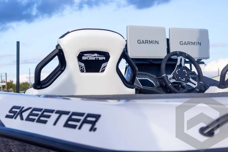 Slide: The Image of 2026 Skeeter FXR21 FLEX boat with dual Garmin displays and steering wheel. - 15