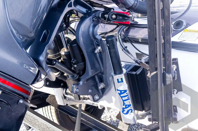 Slide: The Image of Close-up of 2026 Skeeter FXR21 FLEX boat engine components and Atlas hydraulic system. - 17