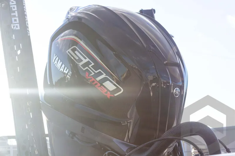 Slide: The Image of Yamaha SHO VMAX engine on 2026 Skeeter FXR21 FLEX boat, sunlit background. - 19
