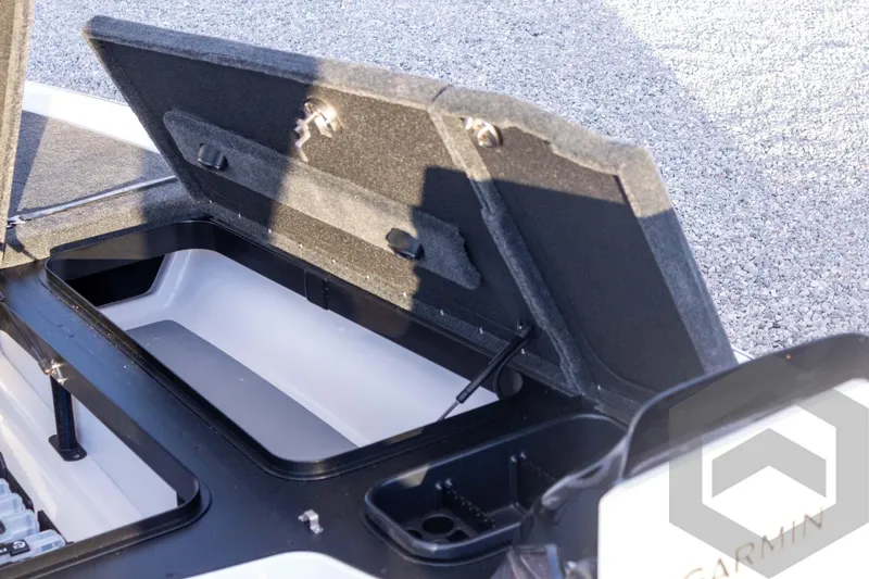 Slide: The Image of Open storage compartment of 2026 Skeeter FXR21 FLEX boat, featuring durable construction. - 29