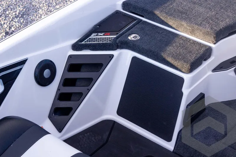 Slide: The Image of 2026 Skeeter FXR21 FLEX boat interior with speaker and storage compartments. - 40
