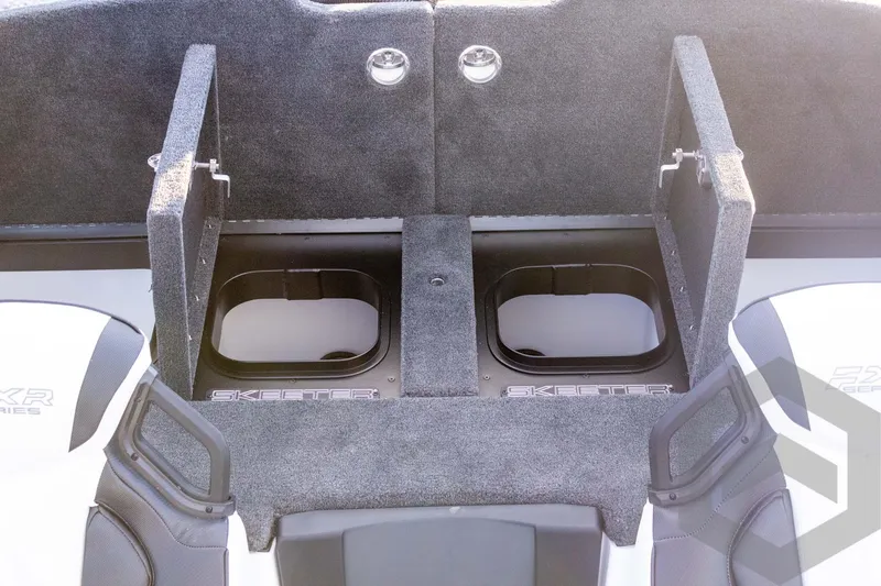 Slide: The Image of 2026 Skeeter FXR21 FLEX boat interior with open storage compartments. - 48