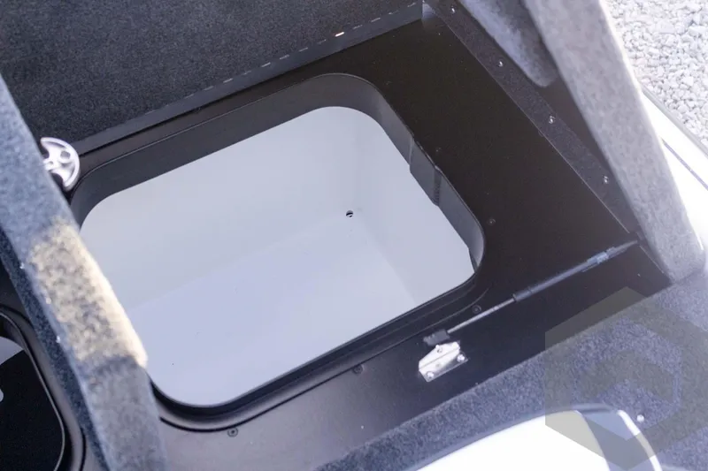 Slide: The Image of Storage compartment of 2026 Skeeter FXR21 FLEX boat, featuring a spacious interior. - 50
