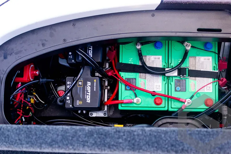 Slide: The Image of Battery compartment of 2026 Skeeter FXR21 FLEX boat, featuring Raptor power system. - 53