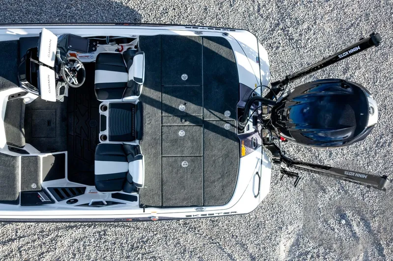 Slide: The Image of 2026 Skeeter FXR21 FLEX boat interior with dual seats and advanced navigation system. - 58