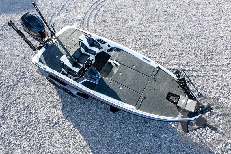 Slide: The Image of 2026 Skeeter FXR21 FLEX fishing boat on gravel surface, top view. - 65