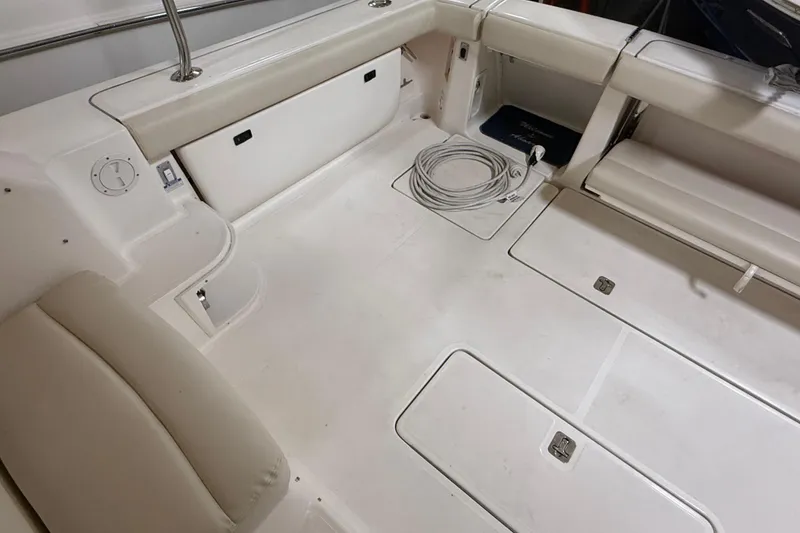 Slide: The Image of 2004 Tiara Yachts 3800 Open, top view of cabin and deck. - 14