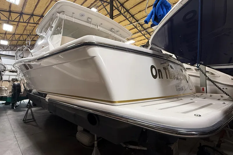 Slide: The Image of 2004 Tiara Yachts 3800 Open in storage, showcasing sleek design and craftsmanship. - 2