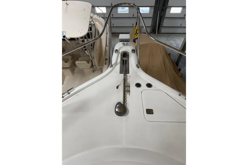 Slide: The Image of 2004 Tiara Yachts 3800 Open interior with seating and American flag. - 6