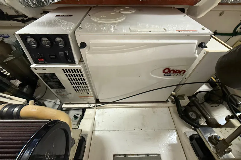 Slide: The Image of Engine room of 2004 Tiara Yachts 3800 Open with Onan generator. - 67