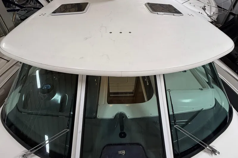 Slide: The Image of 2004 Tiara Yachts 3800 Open in storage, showcasing sleek design and sturdy construction. - 7