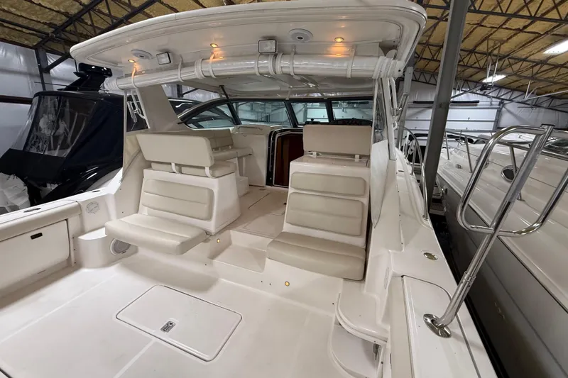 Slide: The Image of 2004 Tiara Yachts 3800 Open deck view with anchor and railing. - 9