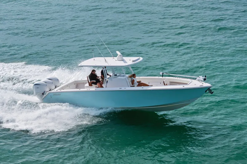 Slide: The Image of 2022 Jupiter 34 HFS boat cruising on open water with passengers onboard. - 4