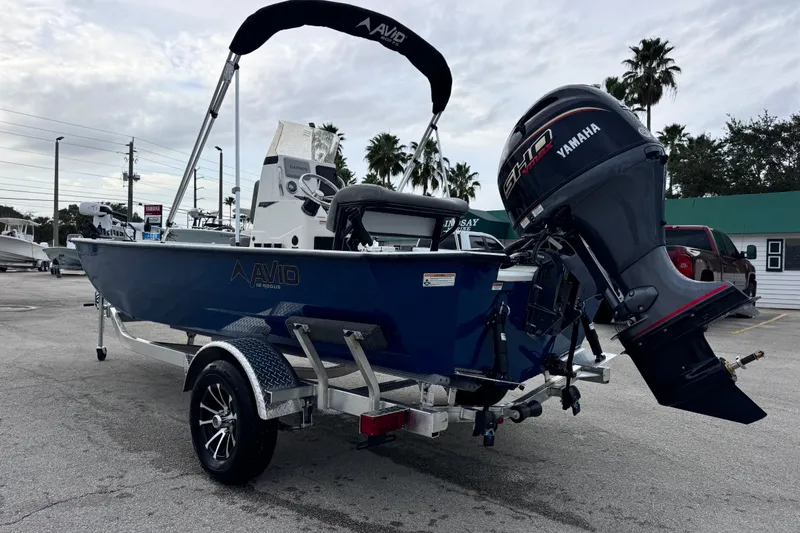 Slide: The Image of 2026 Avid 18 Rogue CC boat with Yamaha motor on trailer. - 3