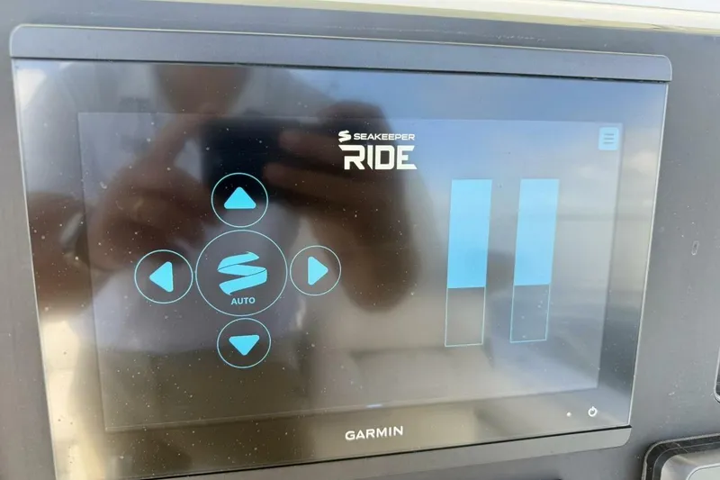 Slide: The Image of Garmin display showing Seakeeper Ride interface on 2006 Regulator 29 Forward Seating boat. - 22