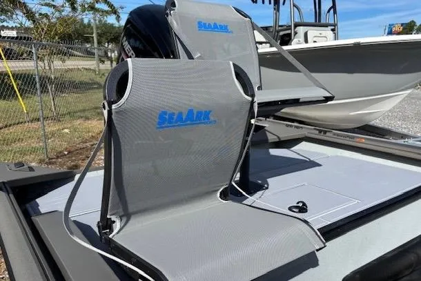 Slide: The Image of 2026 SeaArk Shadow 17 boat seats with logo, outdoor setting. - 5
