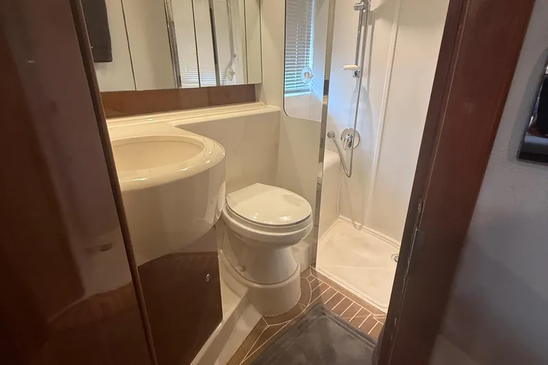 Slide: The Image of Bathroom interior of 2006 Princess V48 yacht with shower and toilet. - 30
