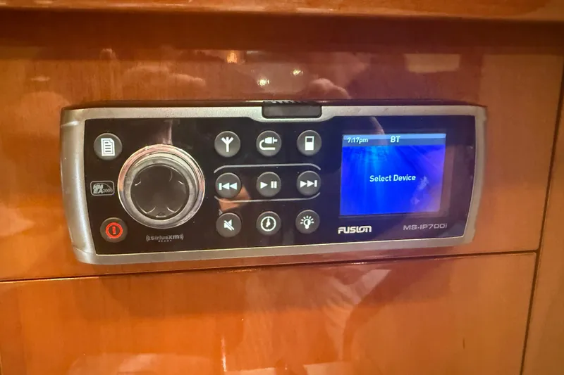 Slide: The Image of Fusion MS-IP700i stereo system on 2006 Princess V48 yacht, displaying "Select Device" on screen. - 35