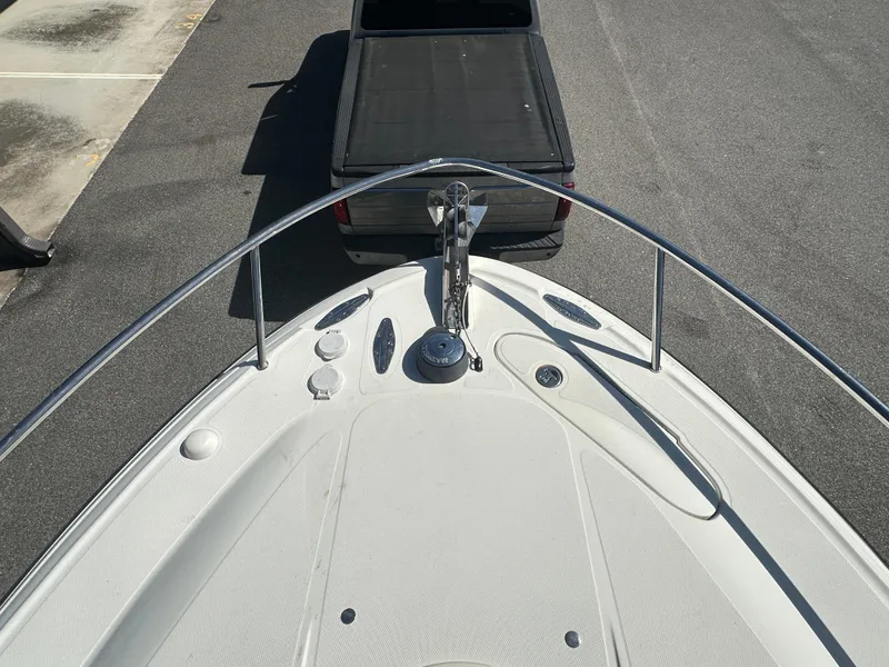 Slide: The Image of 2007 Hydra-Sports Vector 3300 VX boat bow view with truck in background. - 14