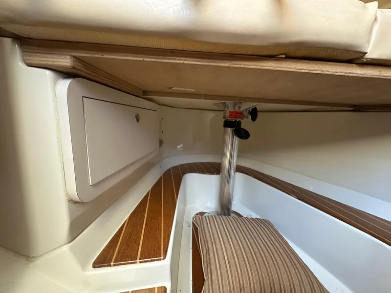 Slide: The Image of 2007 Hydra-Sports Vector 3300 VX cabin interior with wood accents and seating. - 21