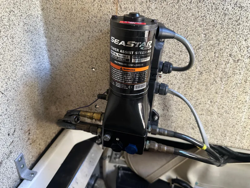Slide: The Image of SeaStar power assist steering unit in a 2007 Hydra-Sports Vector 3300 VX boat. - 28