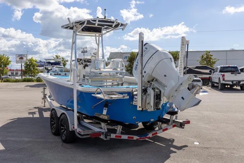 Slide: The Image of 2018 Sea Chaser 23 LX Bay Runner boat on trailer, rear view. - 13