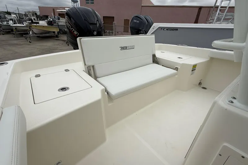 Slide: The Image of 2026 Pathfinder 2400 TRS boat interior with seating and storage compartments. - 11