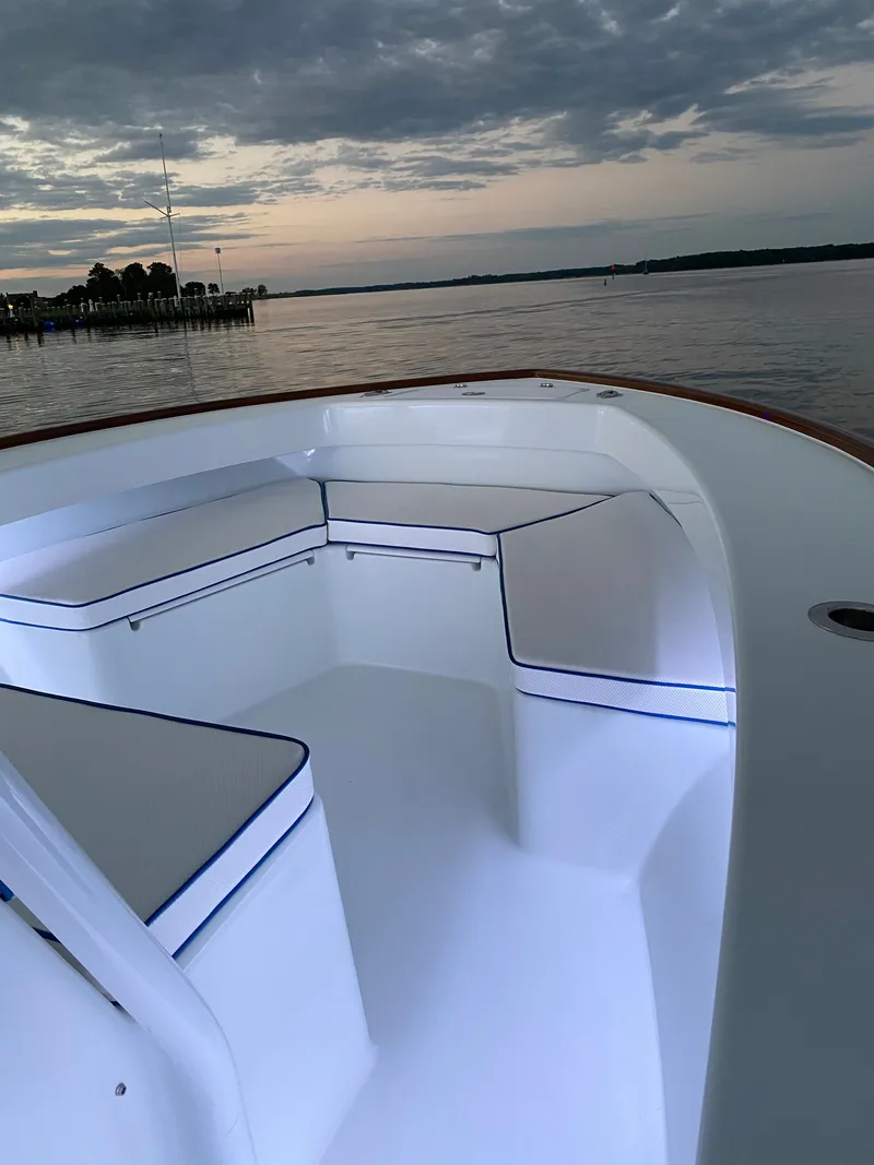 Slide: The Image of Valentino 28CC boat 2023 at sunset on calm waters. - 19