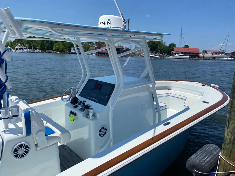 Slide: The Image of Valentino 28CC boat 2023 at dock with modern features. - 22