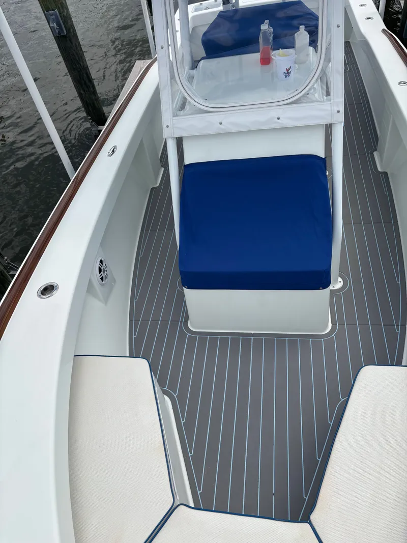 Slide: The Image of Valentino 28CC boat 2023 with blue seats and gray deck. - 27