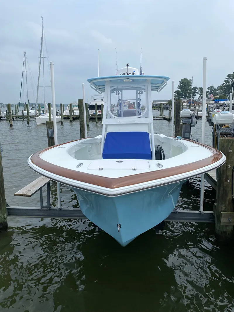 Slide: The Image of Valentino 28CC boat 2023 docked at marina. - 3