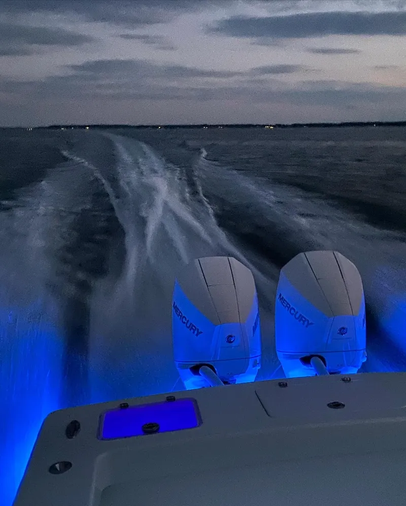 Slide: The Image of Valentino 28CC boat with Mercury engines on night ride, 2023. - 34