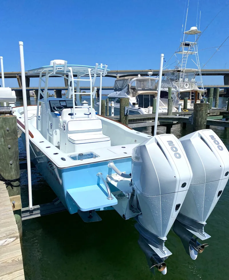 Slide: The Image of Valentino 28CC boat 2023 docked with dual engines. - 5