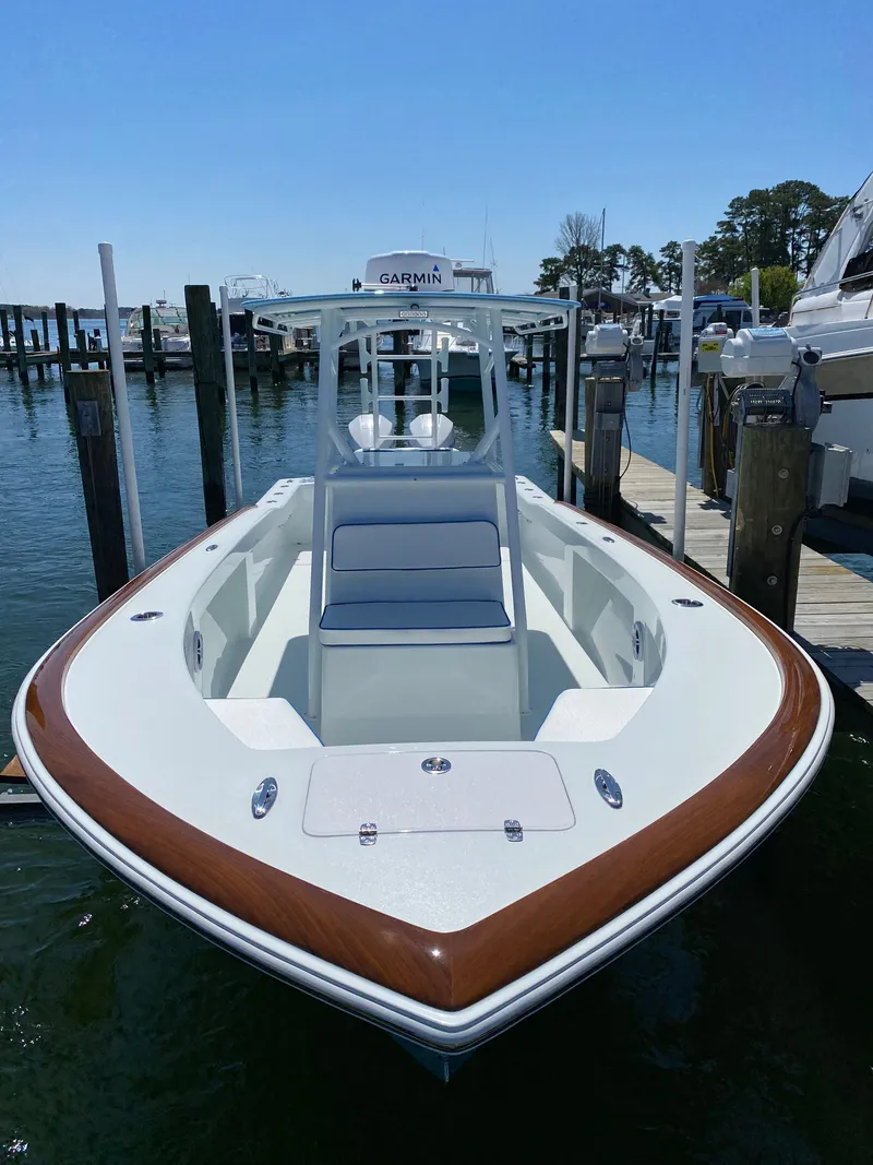 Slide: The Image of Valentino 28CC boat 2023 docked at harbor. - 8