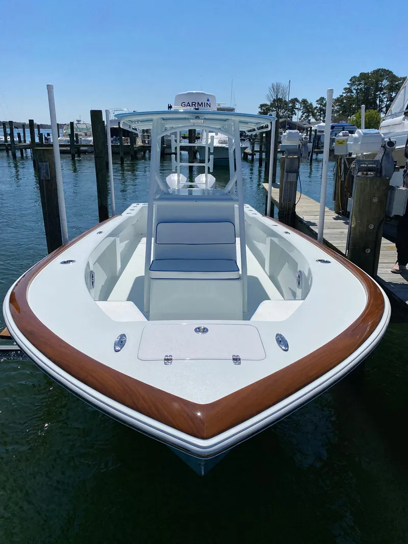 Slide: The Image of Valentino 28CC boat 2023 at dock, sleek design. - 9