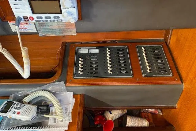 Slide: The Image of Electrical panel and radio equipment on a 1987 Beneteau First 375 sailboat. - 14