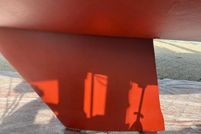 Slide: The Image of Red keel of a 1987 Beneteau First 375 sailboat on dry dock. - 39